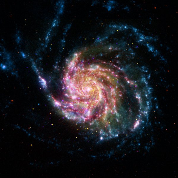 Фотографії космосу. Галактика «Вертушка» в кольорі. Фото: NASA/CXC/SAO/STScI/JPL-Caltech Фотографії космосу. Галактика «Вертушка» в кольорі.