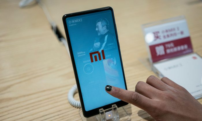 Мобильные телефоны 5G китайских производителей угрожают как зарубежным китайцам, так и национальной безопасности стран
