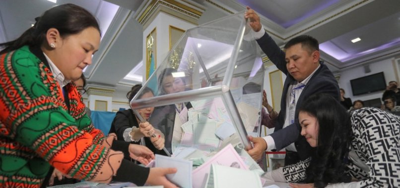 806x378_kazakhs_vote_in_parliamentary_local_elections_1679241868375
