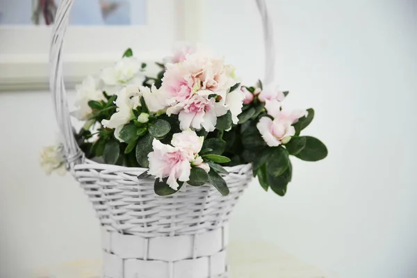 depositphotos_136315134-stock-photo-wicker-basket-with-beautiful-azalea